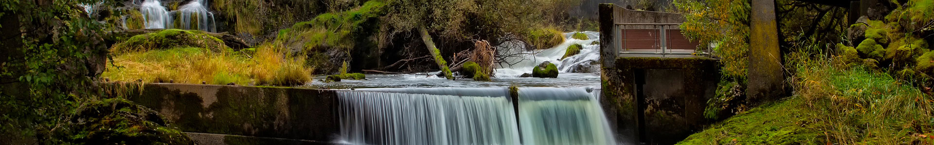 Underside of the Tumwater Bridge with waterfall jumbotron image
