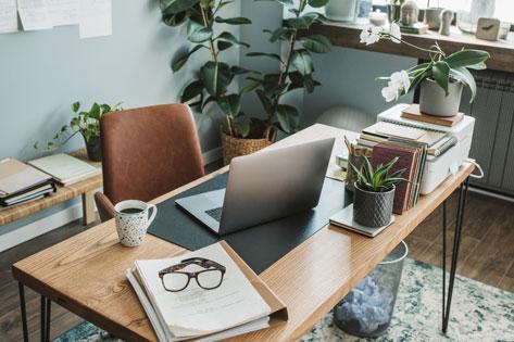 Picture of a desk with a computer representing the thumbnail for Online Application